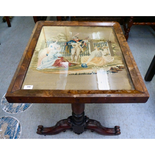 350 - A Victorian mahogany occasional table, the top set with a matched framed tapestry, raised on opposin... 