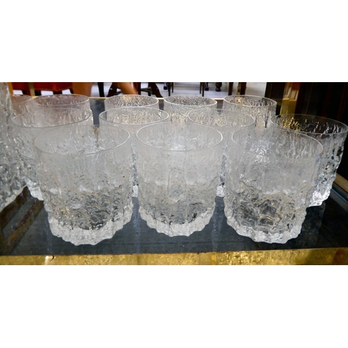 355 - Whitefriars glassware, viz. three bark effect decanters and a set of twelve tumblers