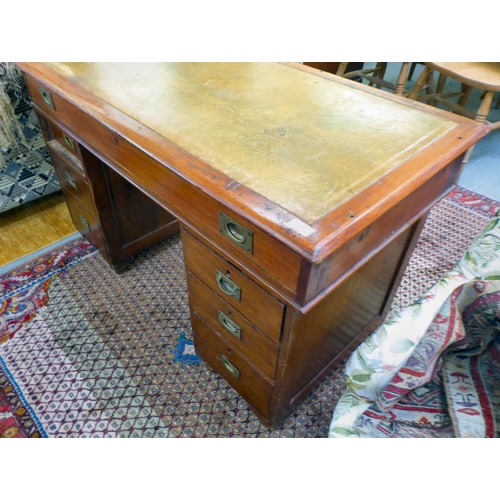 357 - A late Victorian mahogany seven drawer, twin pedestal desk, on a plinth  30