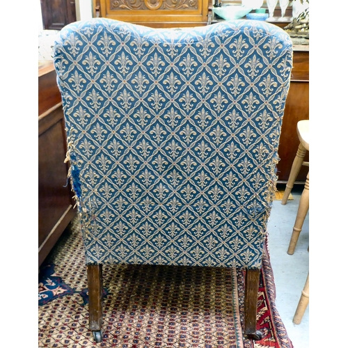 359 - An Edwardian blue fabric upholstered armchair, raised on square mahogany legs 