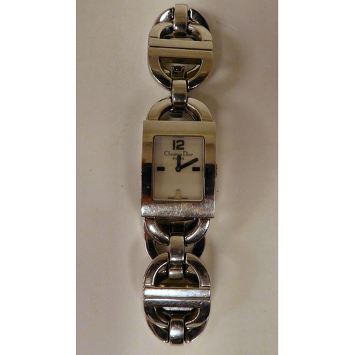 366 - A ladies Christian Dior stainless steel bracelet watch with a mother-of-pearl baton dial 