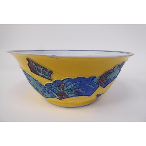 369 - A Japanese Kyoto ware bowl, decorated with fans, on a yellow ground  8