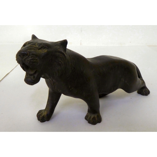 374 - An early 20thC Japanese bronze model, a Jaguar  4.5