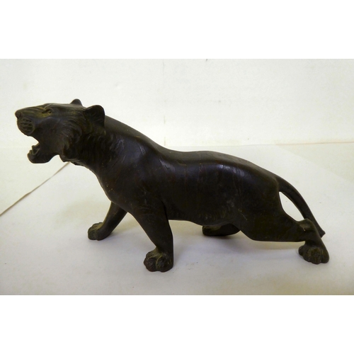 374 - An early 20thC Japanese bronze model, a Jaguar  4.5