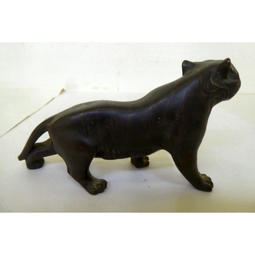 374 - An early 20thC Japanese bronze model, a Jaguar  4.5