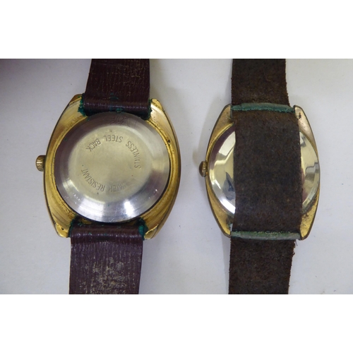 377 - A mixed lot: to include a 1980s Timex gold plated wristwatch, faced by a baton dial, on a brown leat... 