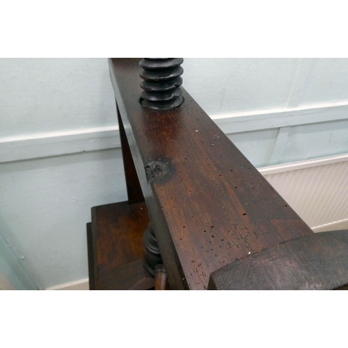 38 - An early 20thC bookpress with a deep drawer and a compatible superstructure, incorporating a central... 