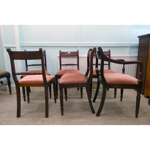 41 - A set of six William IV mahogany framed dining chairs, each with a rope carved splat and upholstered... 