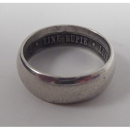 43 - A German East African Society white metal band ring  bears an inscription 