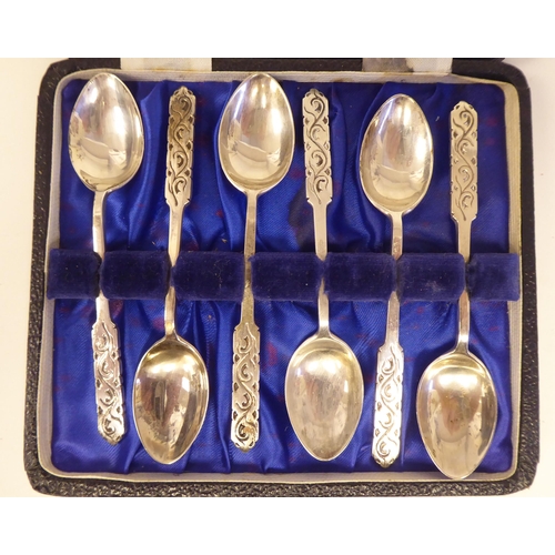 46 - A set of six Liberty & Co silver coffee spoons with cast Celtic inspired terminals  Birmingham 1... 