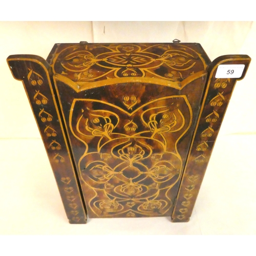 59 - An early 20thC Art Nouveau pokerworked satinwood cabinet with a single door, raised on bracket feet ... 