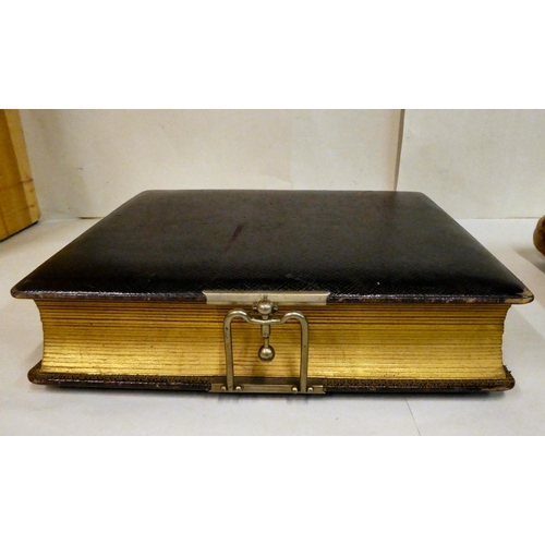 60 - A late Victorian felt covered carte de viste; and a contemporary brown hide album, containing photog... 