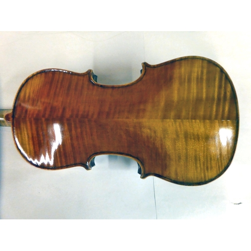 63 - A violin with an inlaid purfled edge and a two-piece back  12.5