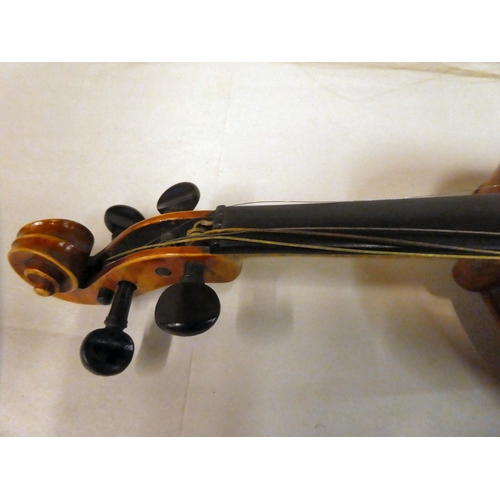 63 - A violin with an inlaid purfled edge and a two-piece back  12.5