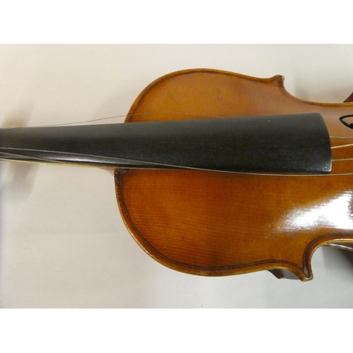 63 - A violin with an inlaid purfled edge and a two-piece back  12.5