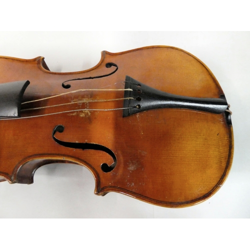 63 - A violin with an inlaid purfled edge and a two-piece back  12.5