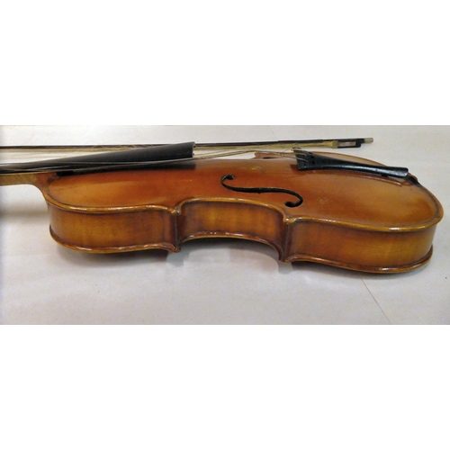 63 - A violin with an inlaid purfled edge and a two-piece back  12.5