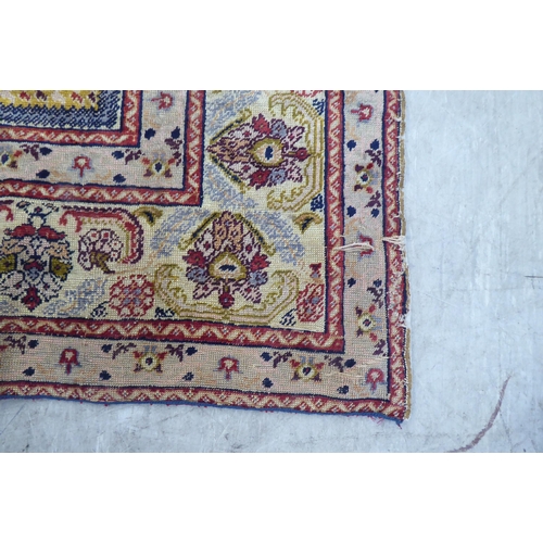 76 - A Turkish prayer mat, on a multi-coloured ground  47