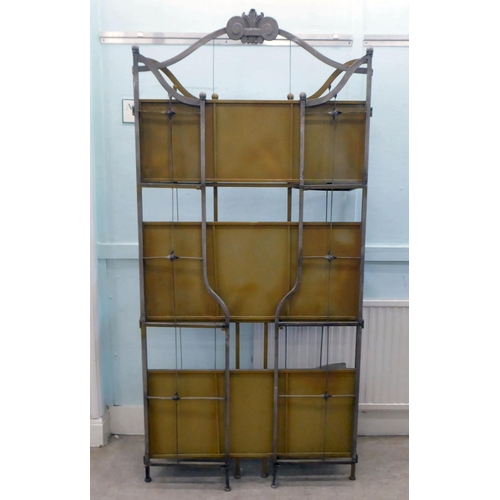 78 - A florists modern shop display stand, the painted tubular metal frame incorporating two pairs of fol... 