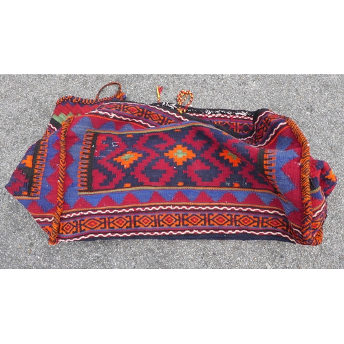 79 - A Qashqai saddle bag, decorated in bright colours 