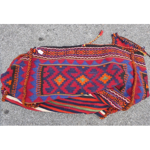 79 - A Qashqai saddle bag, decorated in bright colours 