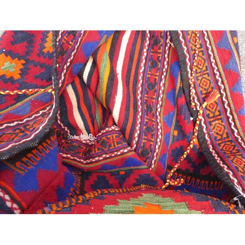 79 - A Qashqai saddle bag, decorated in bright colours 