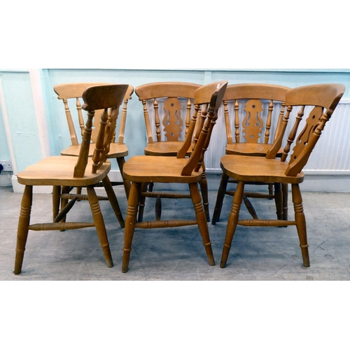 80 - A set of six modern beech framed kitchen chairs with spindled backs and pierced splats, the solid se... 