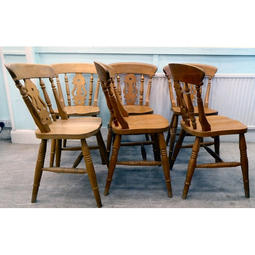 80 - A set of six modern beech framed kitchen chairs with spindled backs and pierced splats, the solid se... 