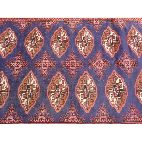 89 - Two dissimilar Turkoman rugs, on red grounds  each 38