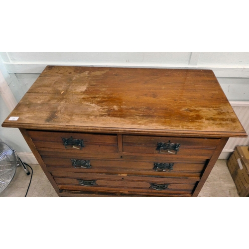 95 - An early 20thC mahogany chest of drawers with two short/three graduated long drawers and cast brass,... 