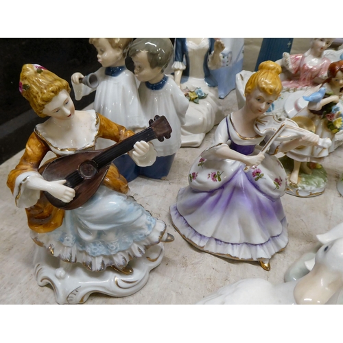 165 - Post World War II European china and porcelain figures and groups: to include examples by Lladro and... 