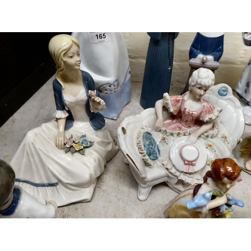 165 - Post World War II European china and porcelain figures and groups: to include examples by Lladro and... 