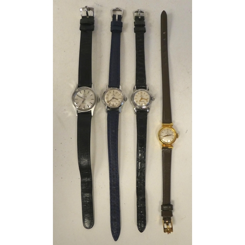 102 - Four ladies Omega stainless steel cased wristwatches, variously faced by baton dials, on hide straps