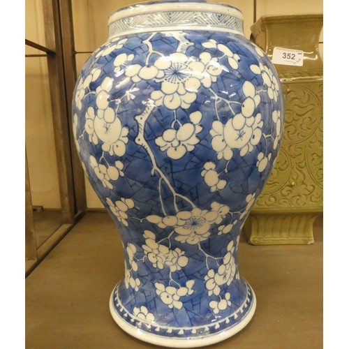 352 - Early 20thC Oriental ceramics: to include a Celadon glazed porcelain, box design vase with inscribed... 