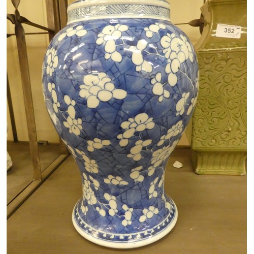 352 - Early 20thC Oriental ceramics: to include a Celadon glazed porcelain, box design vase with inscribed... 