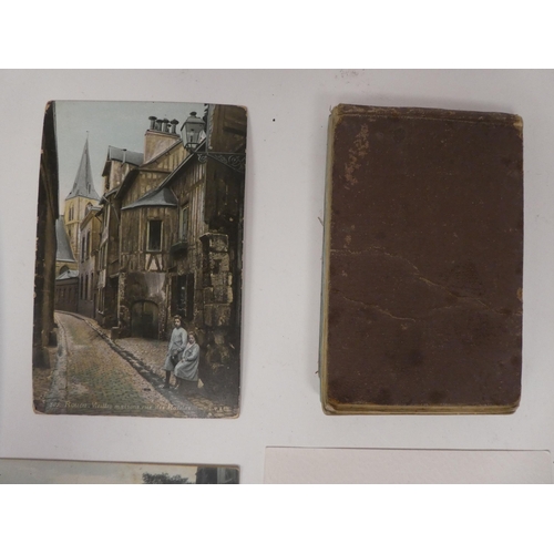 10 - A circa 1930s and later autograph album, bearing signatures and four loose postcards