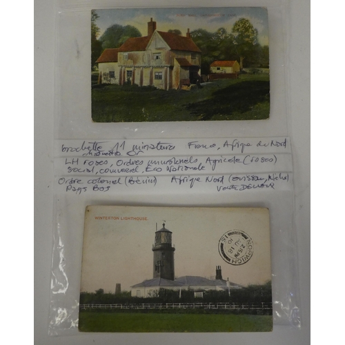 10 - A circa 1930s and later autograph album, bearing signatures and four loose postcards