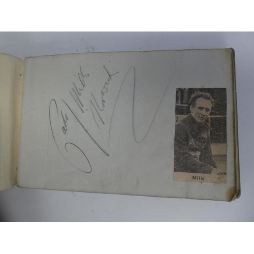 10 - A circa 1930s and later autograph album, bearing signatures and four loose postcards