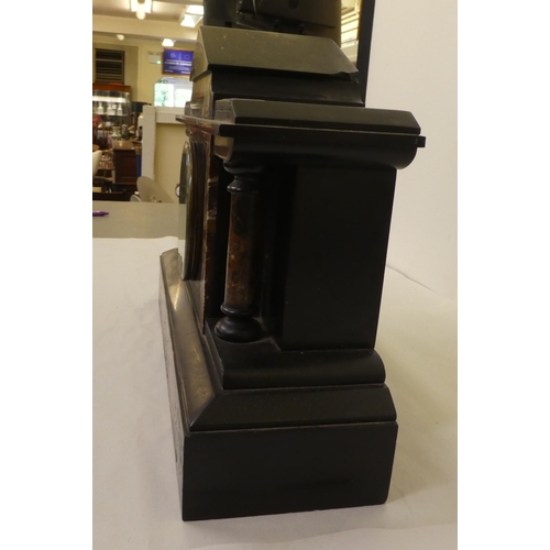 105 - A late 19thC black slate and marble mantel clock of architectural form; the gong strike movement fac... 