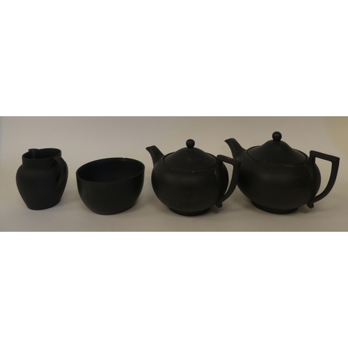 107 - Ceramics: to include Wedgwood bassalt teapots; and a Studio pottery salt and pepper  3.5