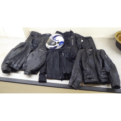 110 - Various motorcycle clothing: to include Mercury black leather trousers  size 36; and an FM helm... 