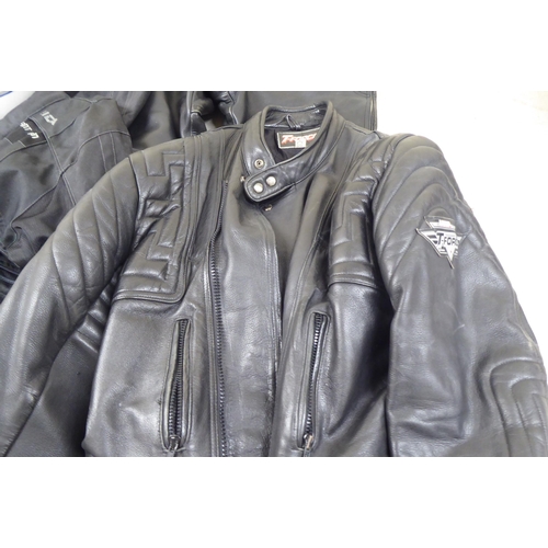 110 - Various motorcycle clothing: to include Mercury black leather trousers  size 36; and an FM helm... 