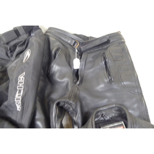 110 - Various motorcycle clothing: to include Mercury black leather trousers  size 36; and an FM helm... 