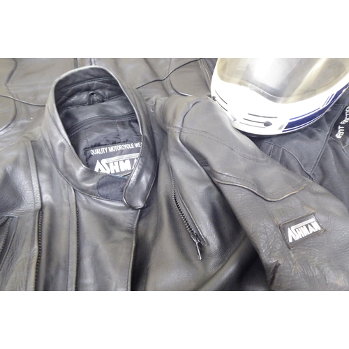 110 - Various motorcycle clothing: to include Mercury black leather trousers  size 36; and an FM helm... 