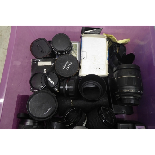 25 - Photographic equipment: to include camera bodies; and a selection of lenses