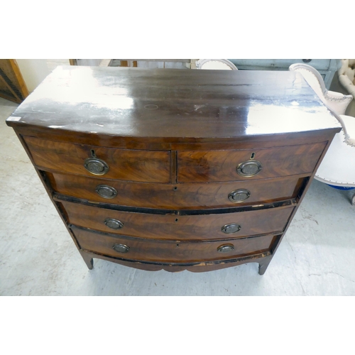 28 - A mid Victorian mahogany five drawer, bowfront dressing chest, raised on tapered legs  41