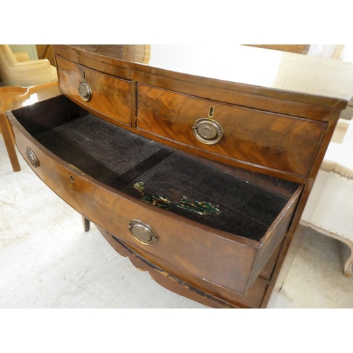 28 - A mid Victorian mahogany five drawer, bowfront dressing chest, raised on tapered legs  41