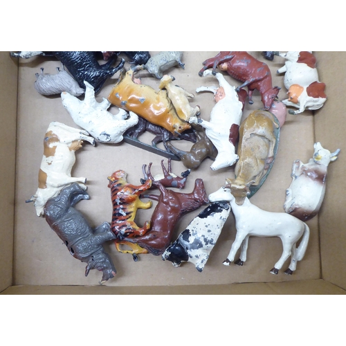 29 - Overpainted lead figures on horseback; and farmyard animals