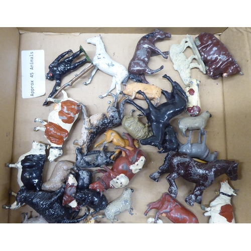 29 - Overpainted lead figures on horseback; and farmyard animals