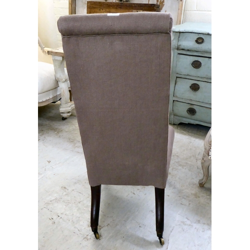 50 - A William IV and later fabric upholstered high back nursing chair, raised on turned forelegs and cas... 